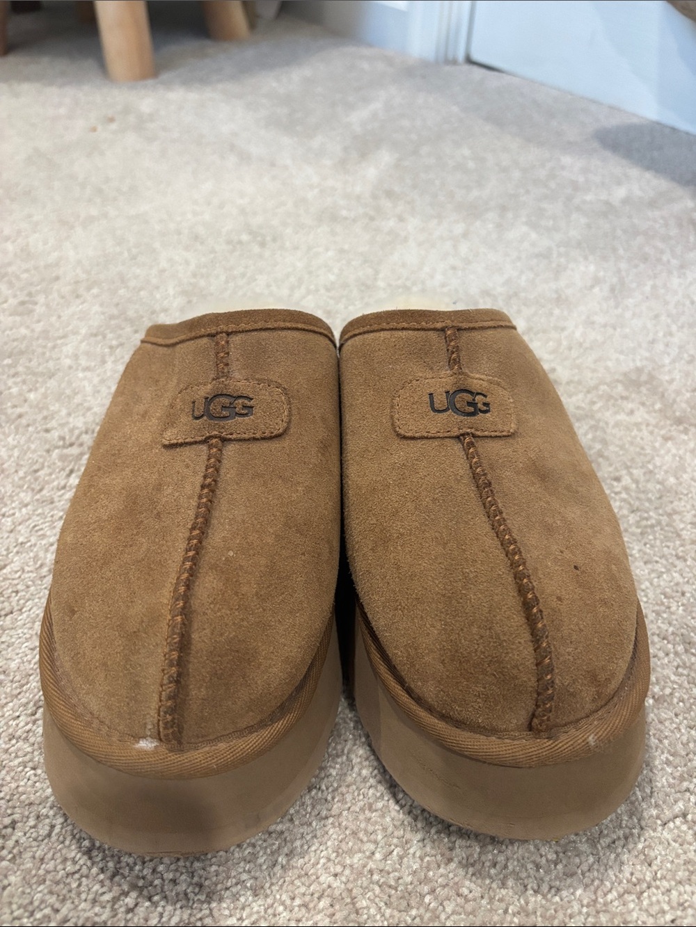 UGG women’s Chestnut Suede Shearling Clog Slippers
